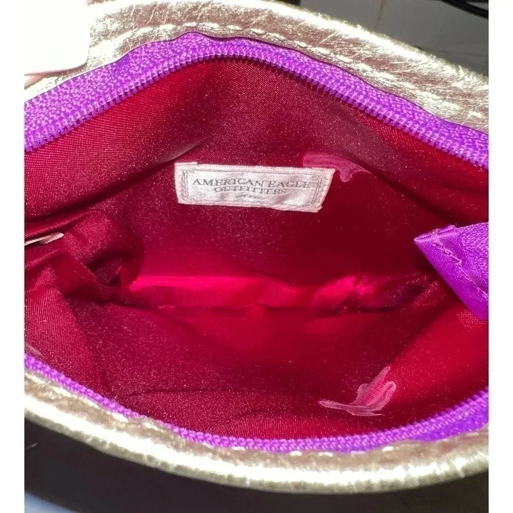 American Eagle purple wristlet.